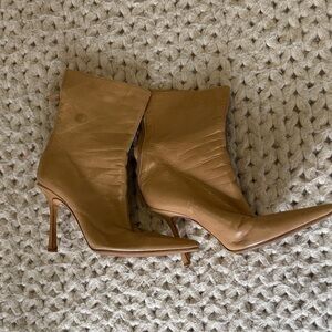 Jimmy choo pointy toe boots
One stain on one side great condition